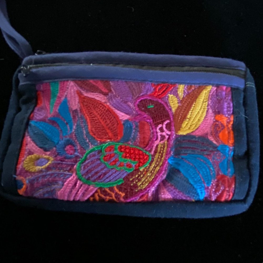 Wristlet from Mexico, embroidered by hand.about 6" long